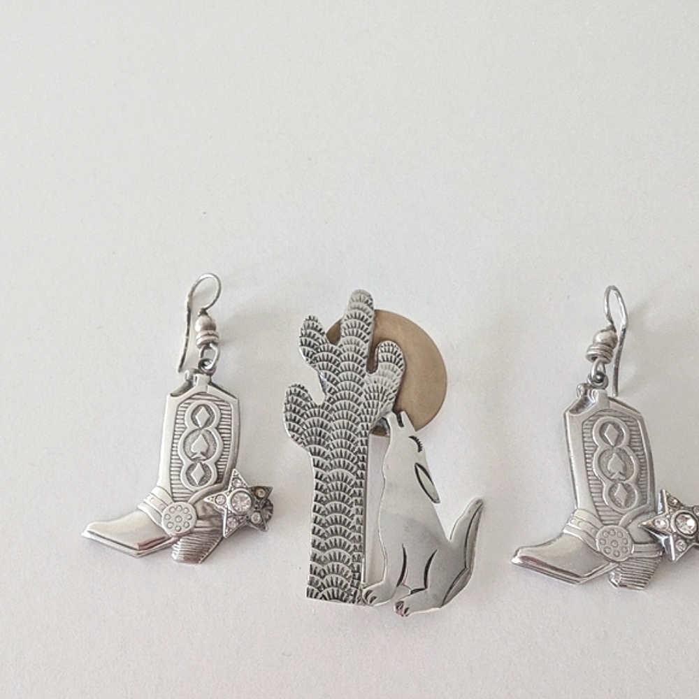 Sterling silver country and western earrings and pink.